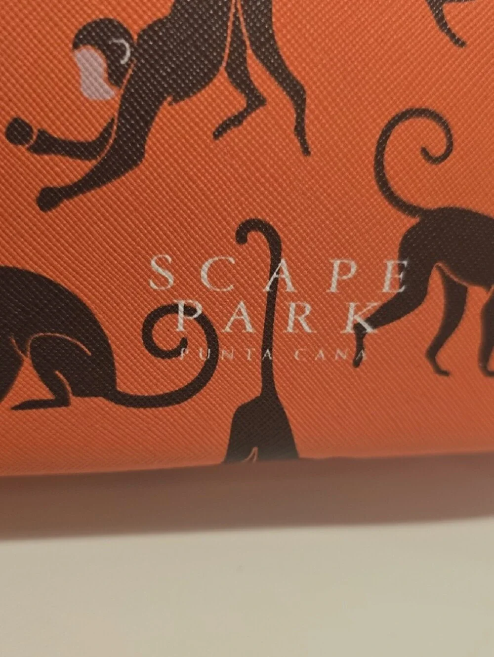 Scape Park Orange Wristlet Pouch with Navy Trim and Black Monkey Print